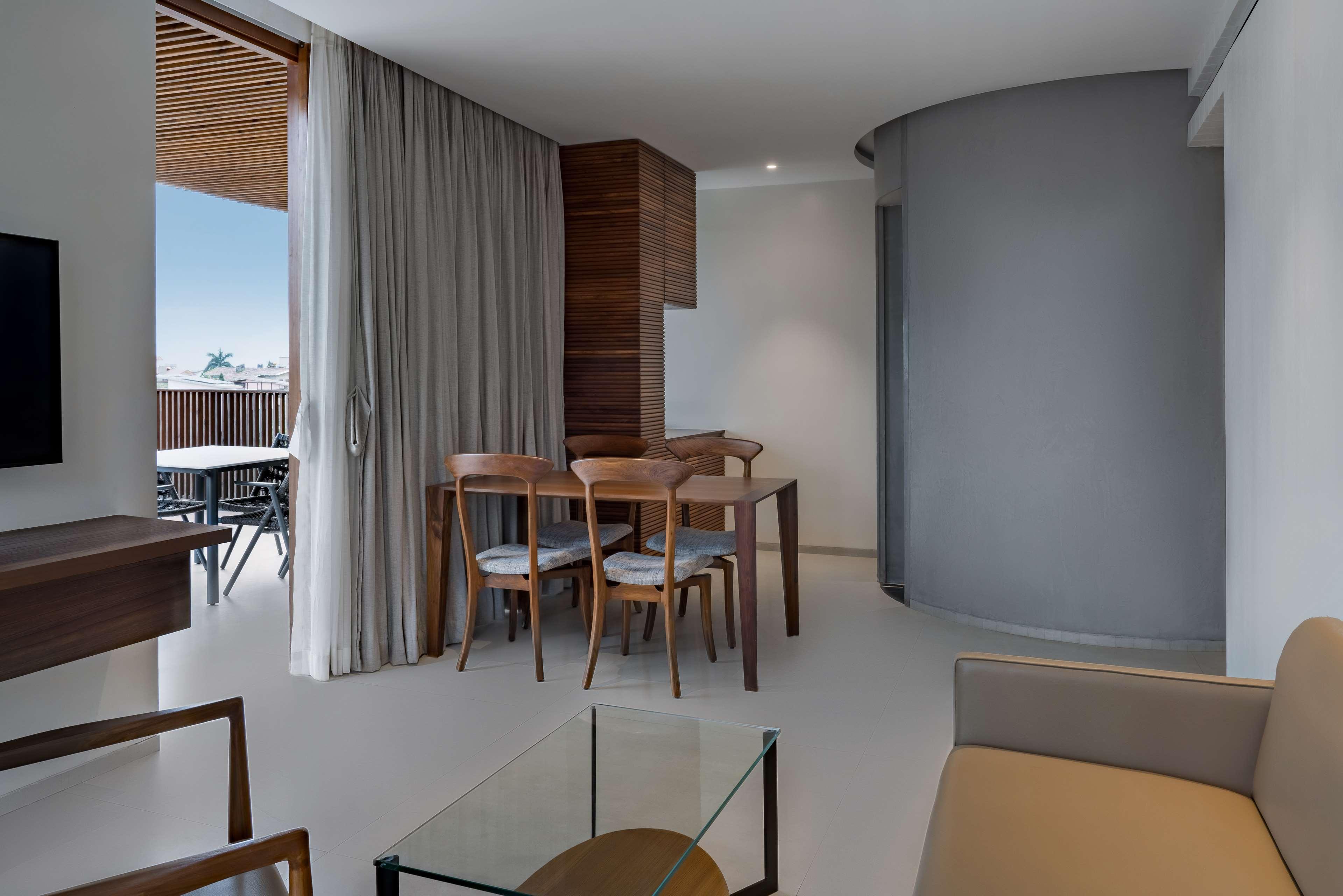Radisson Resort And Spa Lonavala Bagian luar foto A typical apartment interior