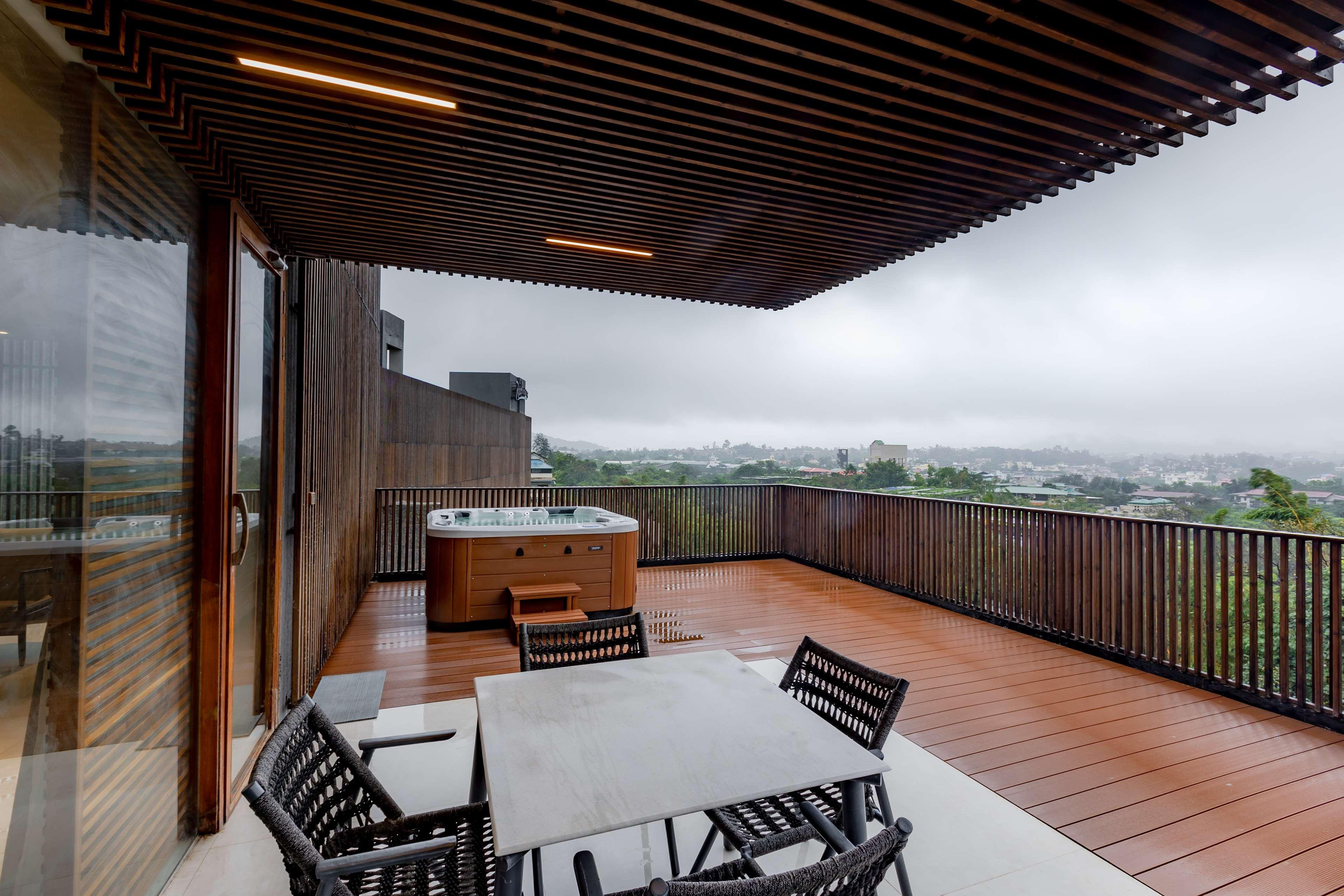 Radisson Resort And Spa Lonavala Bagian luar foto A rooftop terrace