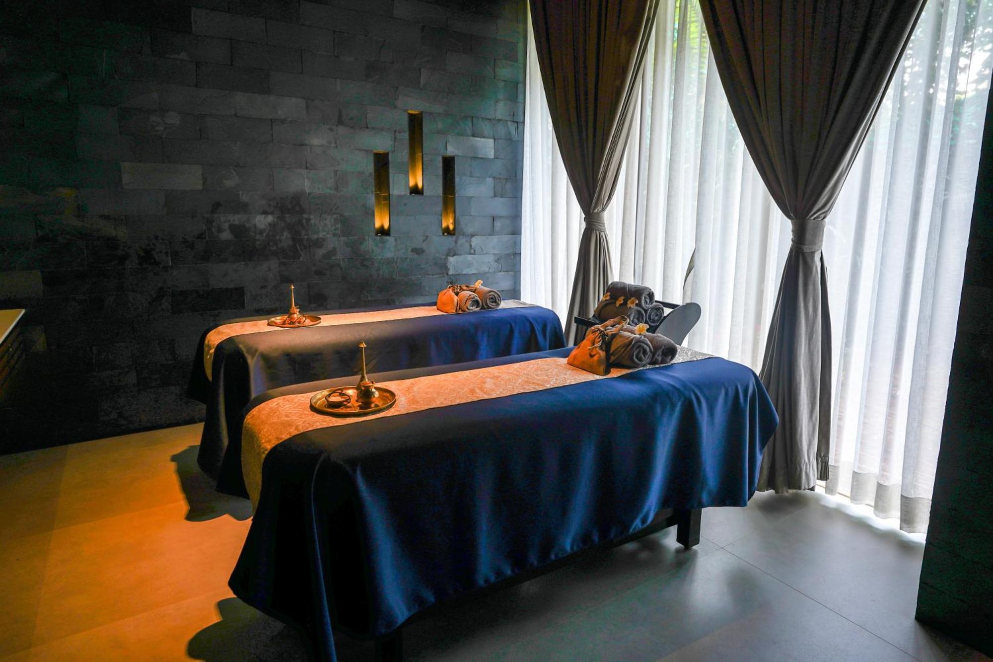 Radisson Resort And Spa Lonavala Bagian luar foto Massage beds at a spa